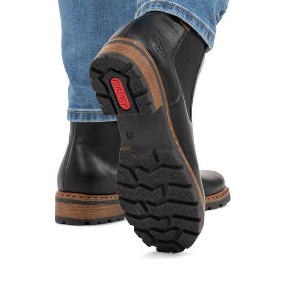 Rieker Z9354-00 women's black side zip ankle boots, lifestyle view 3 of 8.