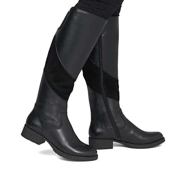 Rieker Z9566-00 women's black leather water resistant side zip knee high boots, on-foot lifestyle view.