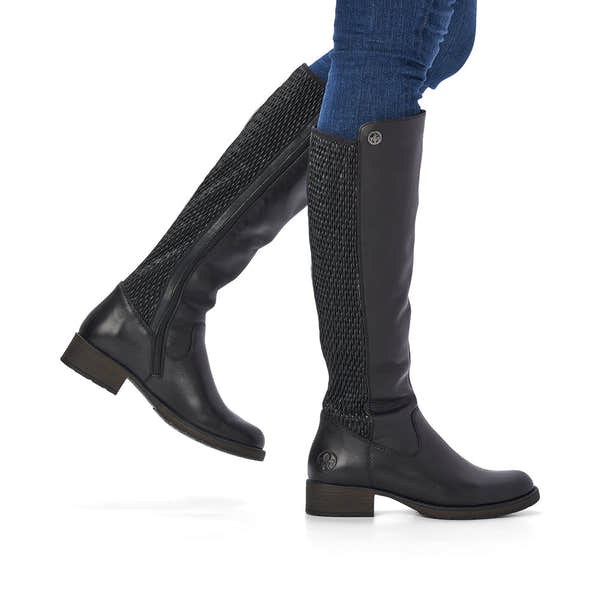 Rieker Z9591-00 women's black leather side zip knee high boots, on-foot lifestyle view.