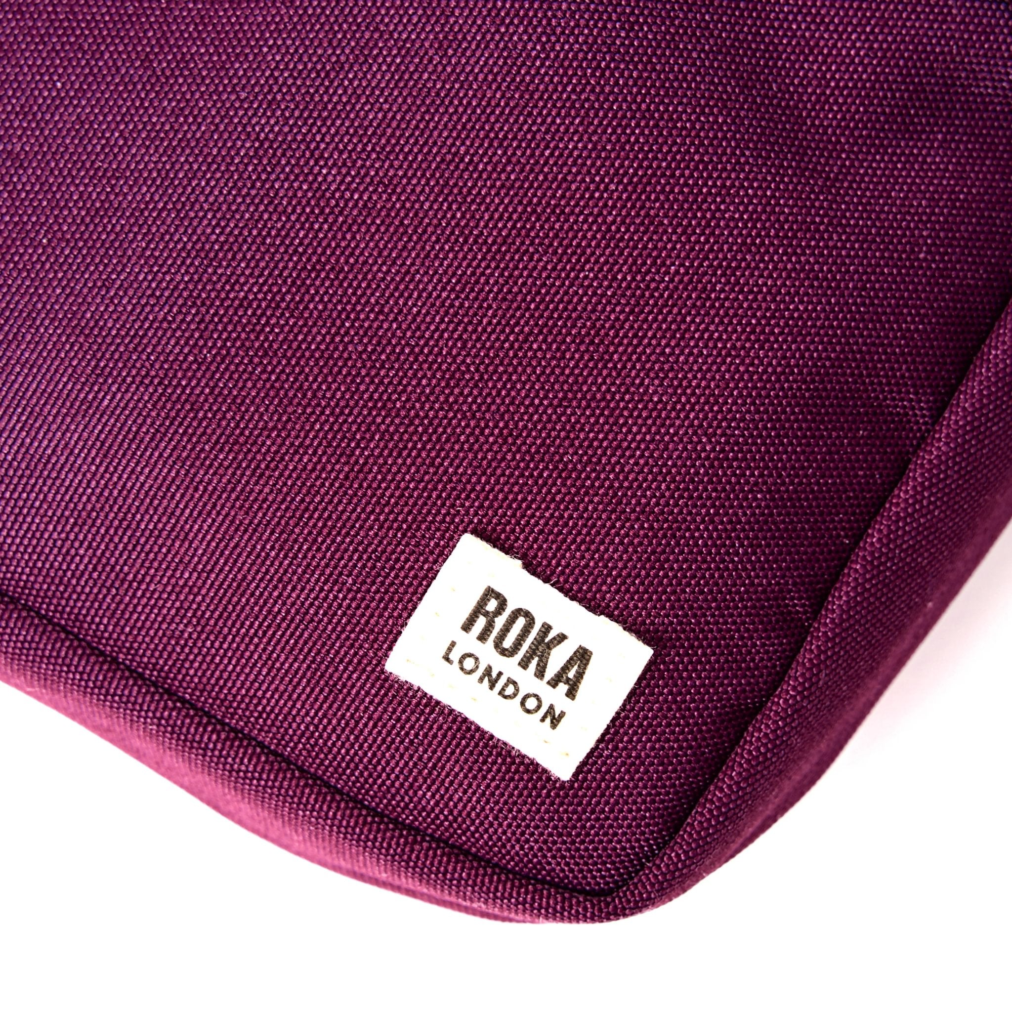 Roka Bond Cherry Lacquer Recycled Canvas One Size, brand label detail.