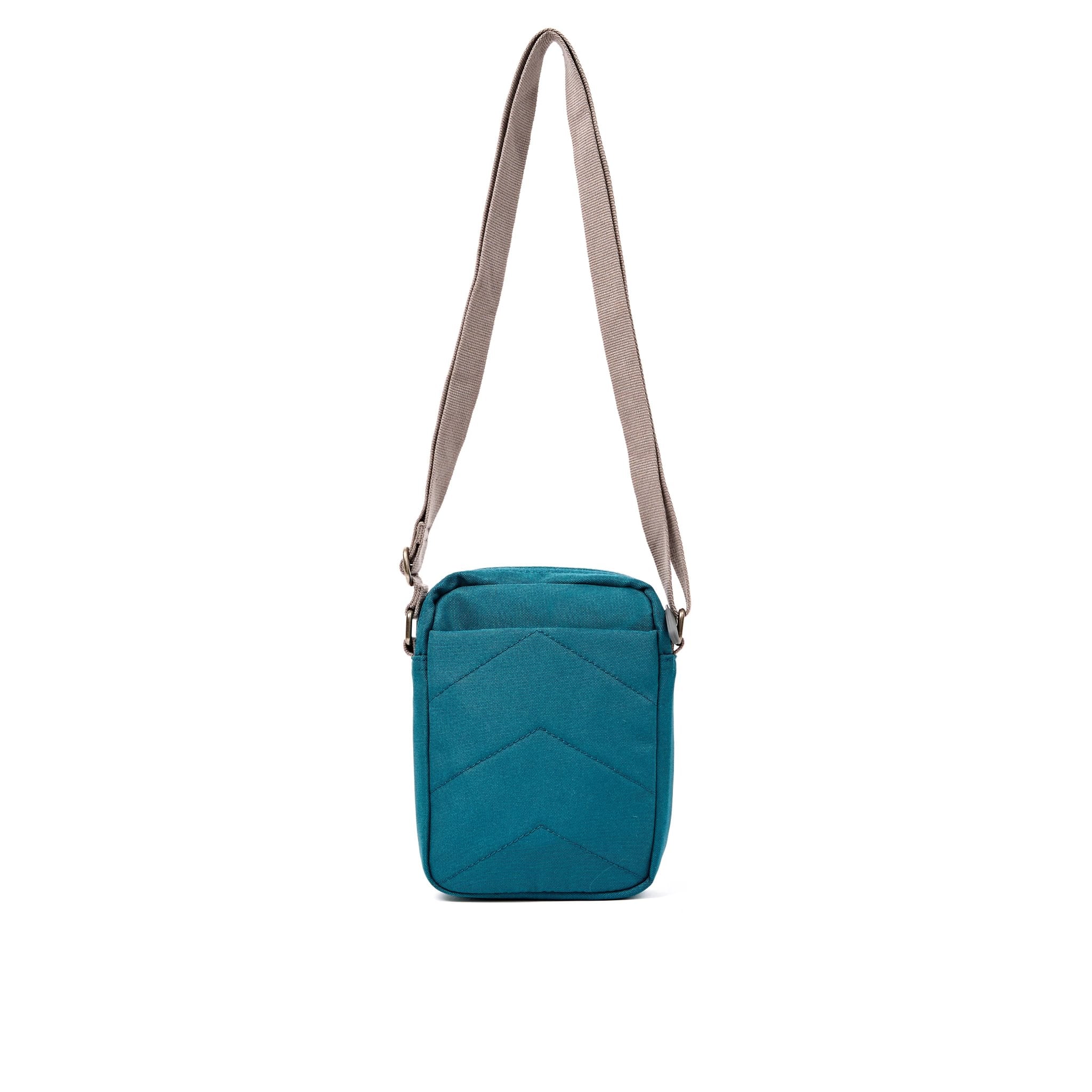 Roka Bond Deep Teal Recycled Canvas Crossbody Bag, back view.