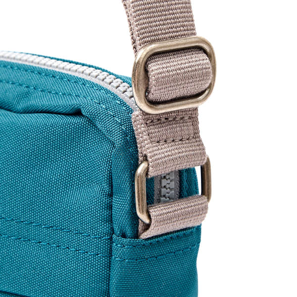 Roka Bond Deep Teal Recycled Canvas Crossbody Bag, hardware detail.