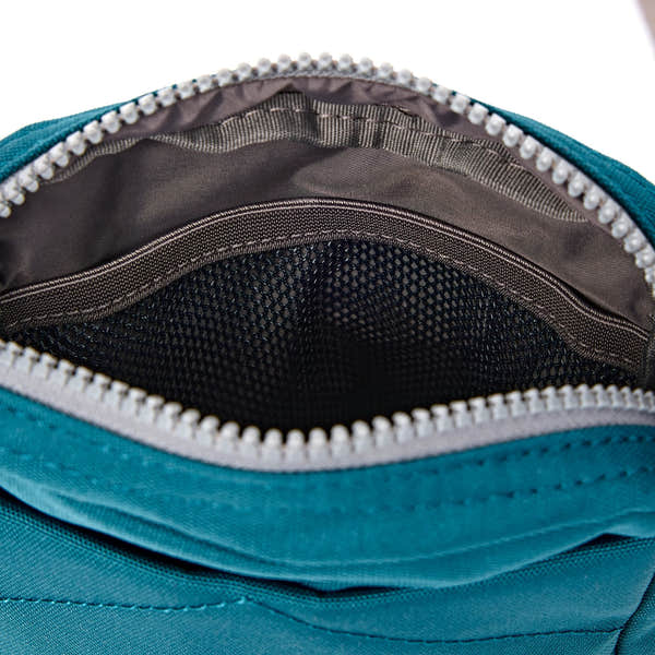Roka Bond Deep Teal Recycled Canvas Crossbody Bag, second interior view.