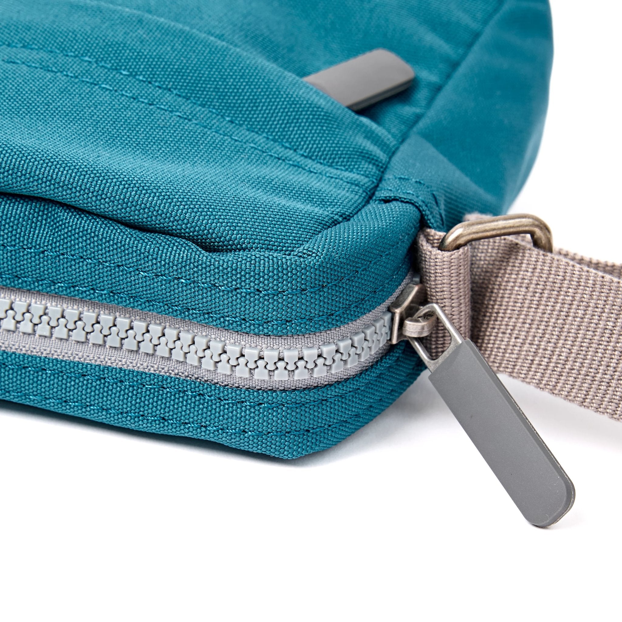 Roka Bond Deep Teal Recycled Canvas Crossbody Bag, zip detail.