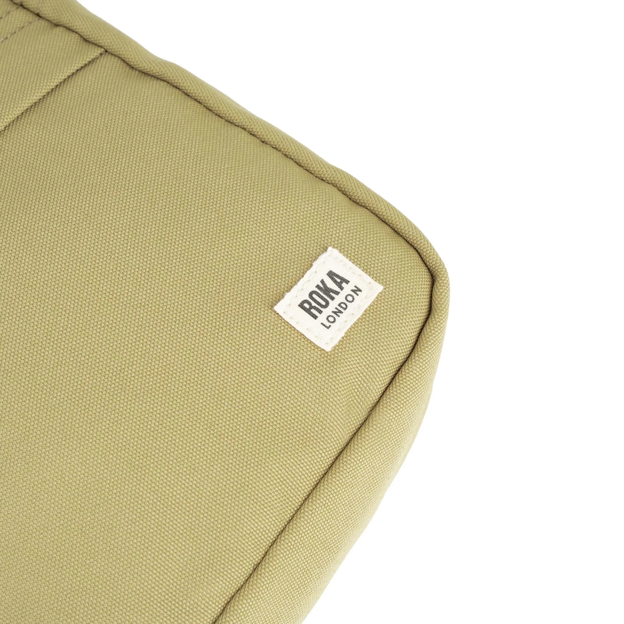 Roka Bond Khaki One Size Recycled Canvas, brand label detail.