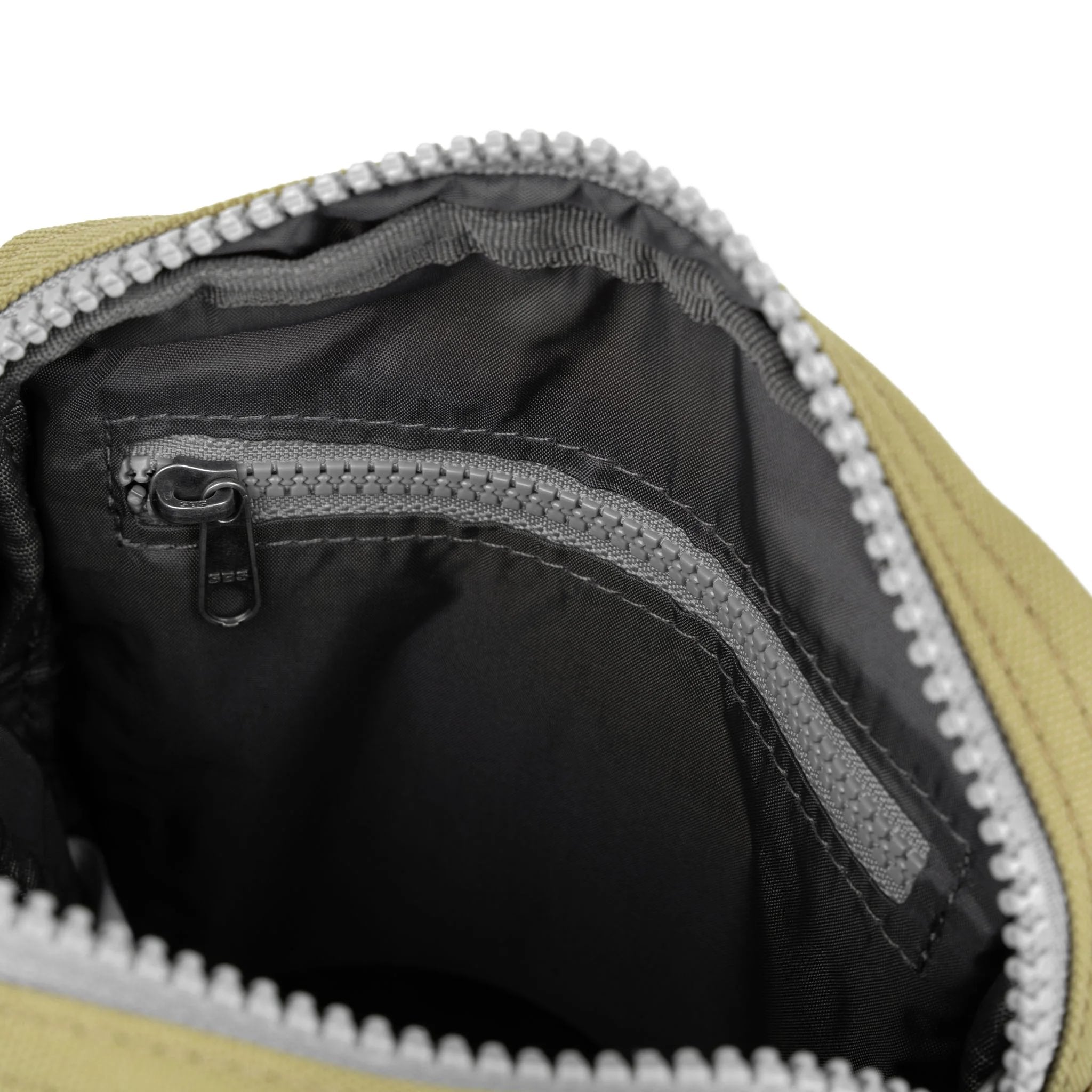 Roka Bond Khaki One Size Recycled Canvas, side view.