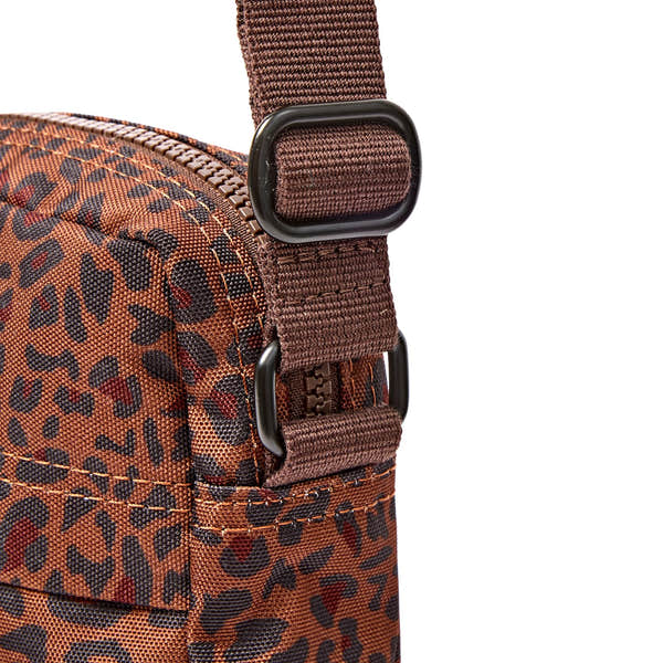 Roka Bond Mini Leopard Recycled Canvas Crossbody Bag, hardware detail.