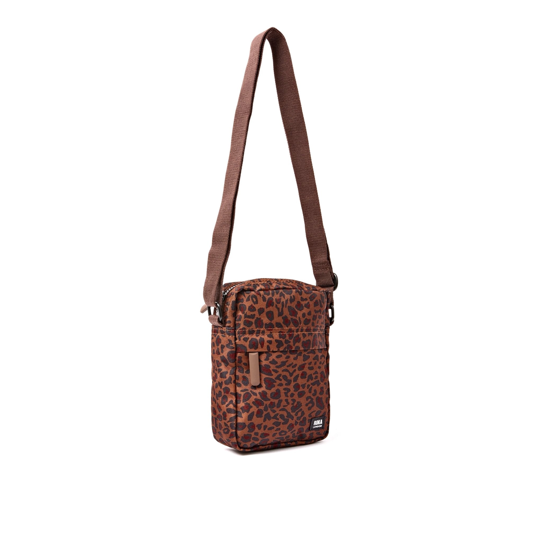 Roka Bond Mini Leopard Recycled Canvas Crossbody Bag, side view.