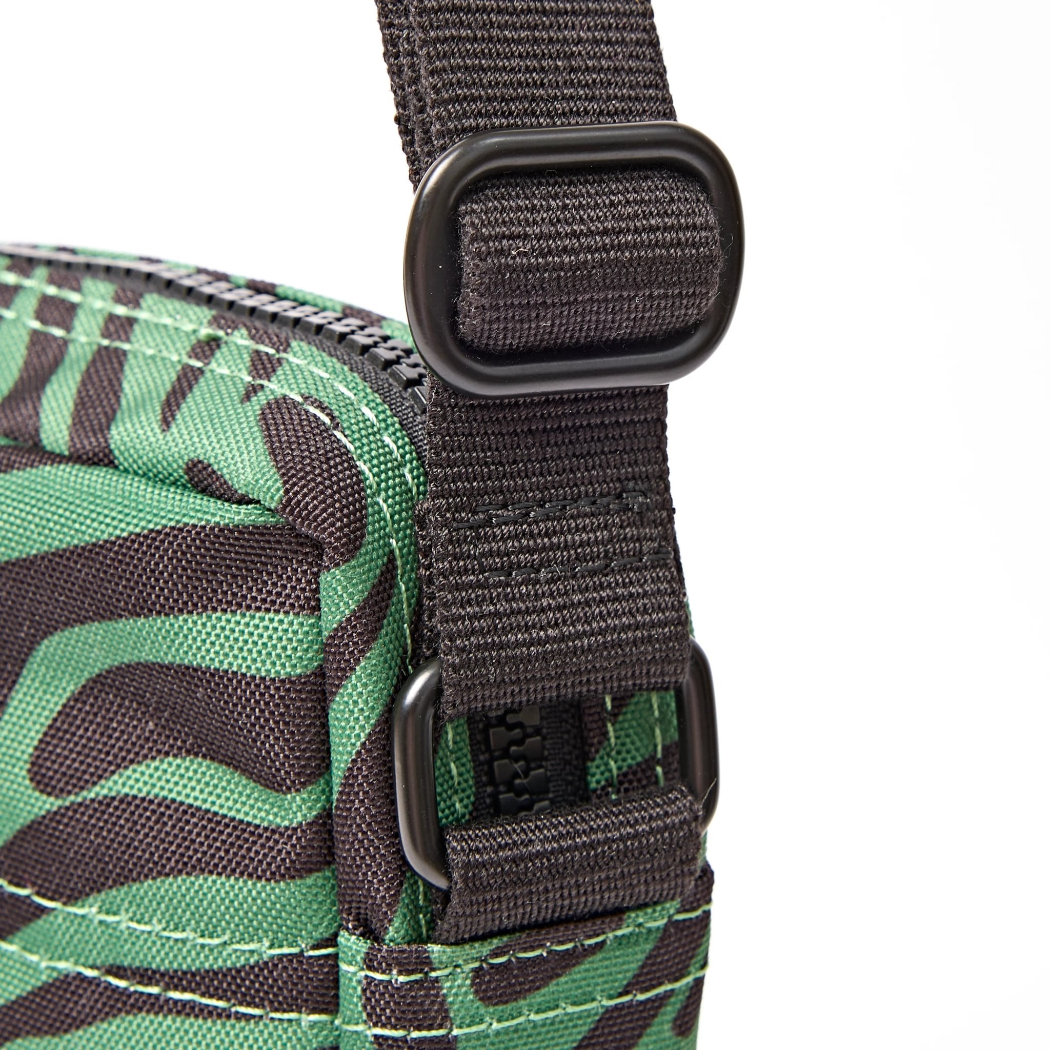 Roka Bond Mixed Animal Artichoke Recycled Canvas Crossbody Bag, hardware detail.