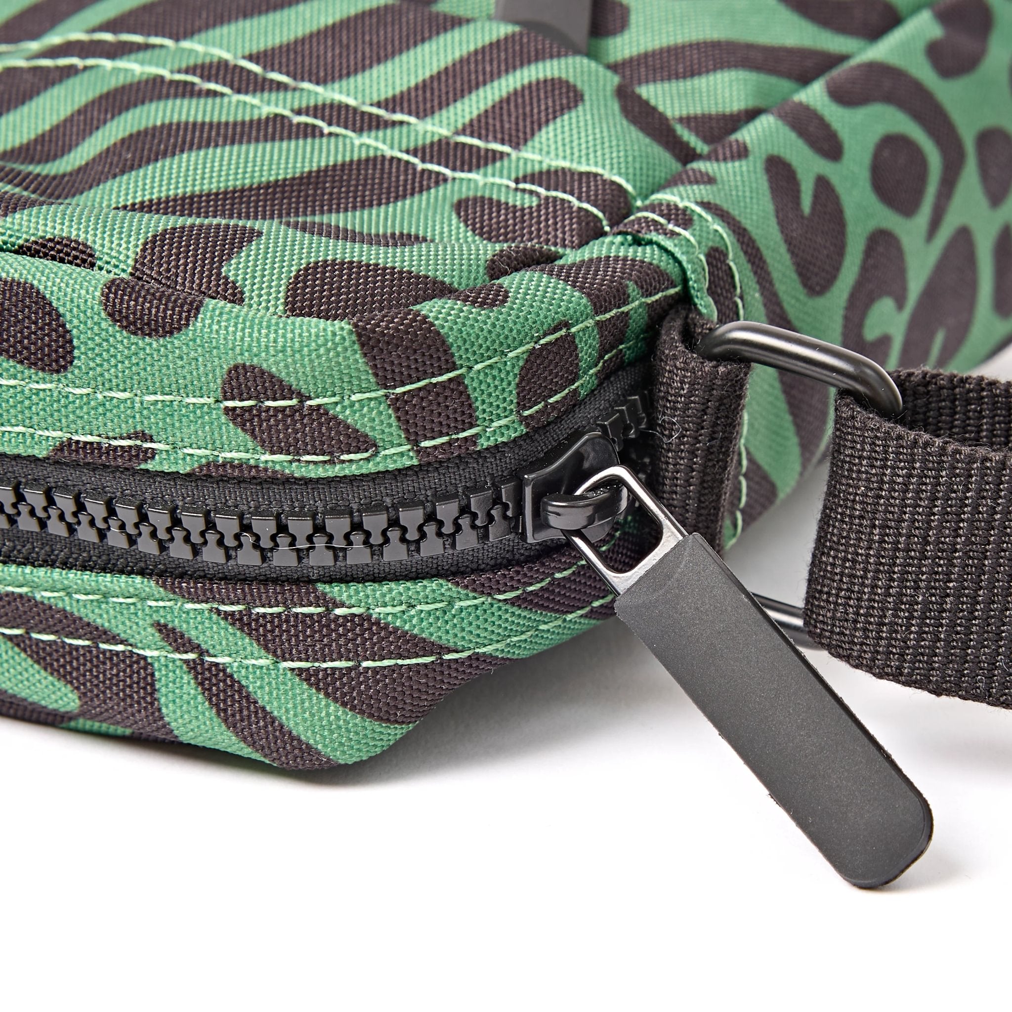 Roka Bond Mixed Animal Artichoke Recycled Canvas Crossbody Bag, zip detail.