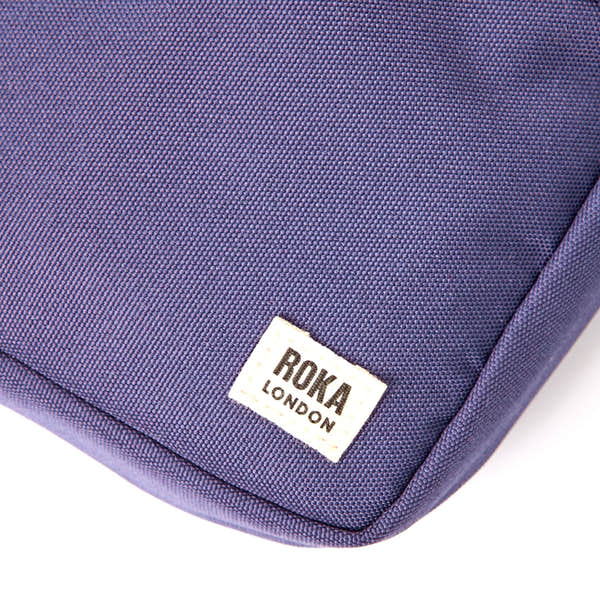 Roka Bond Oceana Recycled Canvas Crossbody Bag, brand label detail.
