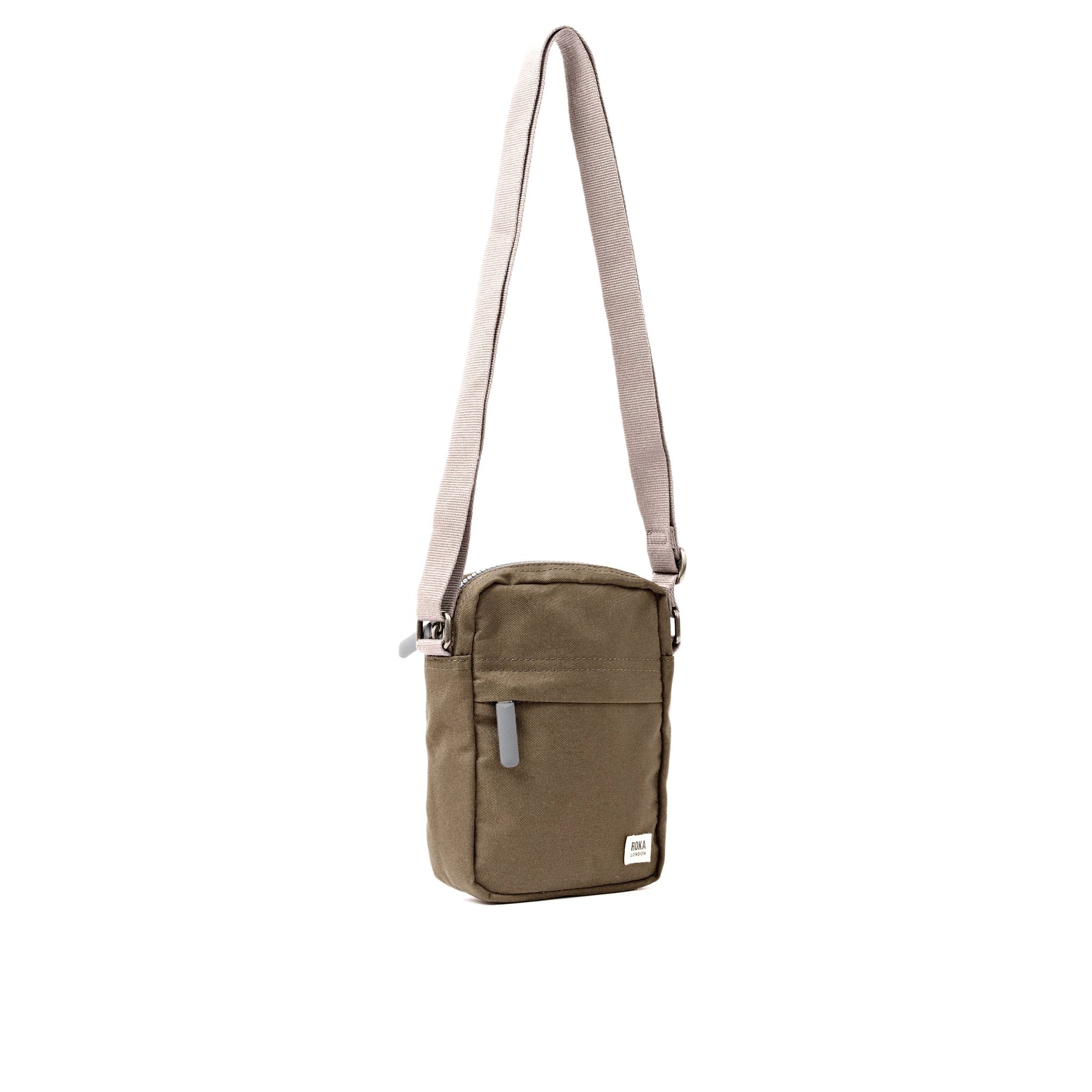Roka Bond Sea Spray Recycled Canvas Crossbody Bag, side view.