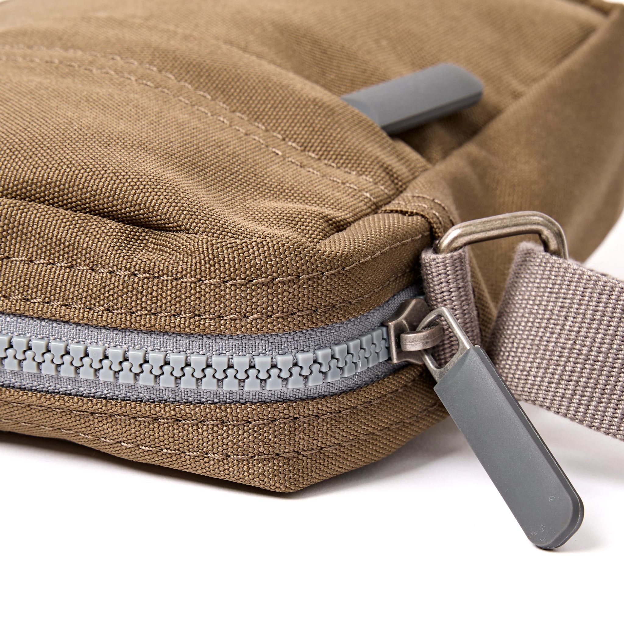 Roka Bond Sea Spray Recycled Canvas Crossbody Bag, zip detail.