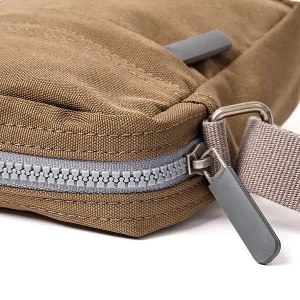 Roka Bond Sea Spray Recycled Canvas Crossbody Bag, zip detail.