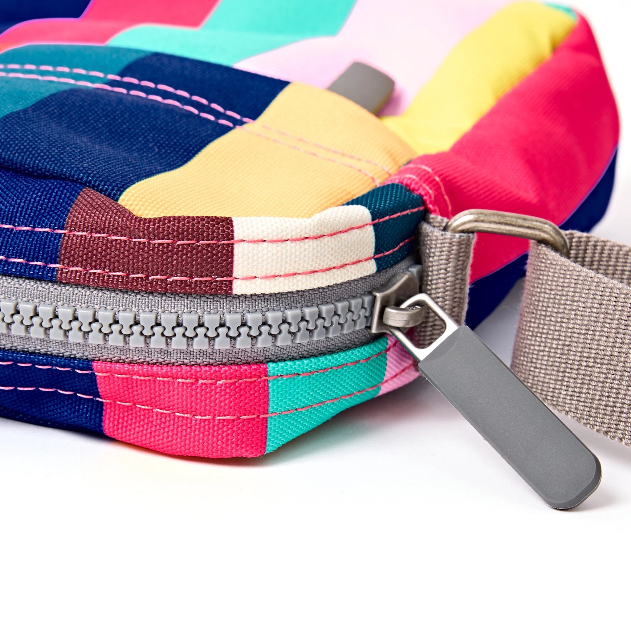 Roka Bond Wide Multi Stripe Recycled Canvas Crossbody Bag, zip detail.