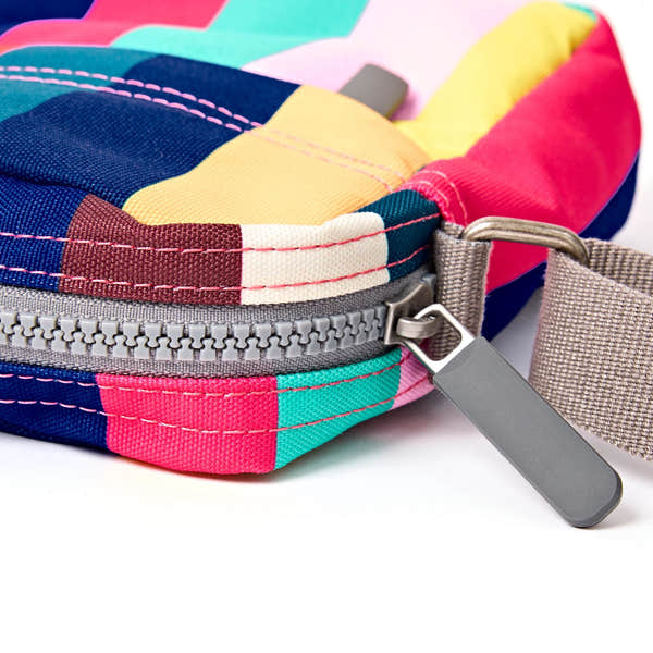 Roka Bond Wide Multi Stripe Recycled Canvas Crossbody Bag, zip detail.