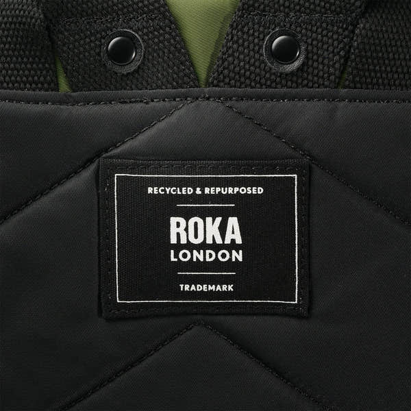 Roka Canfield Medium Avocado Recycled Nylon Backpack, brand label detail.