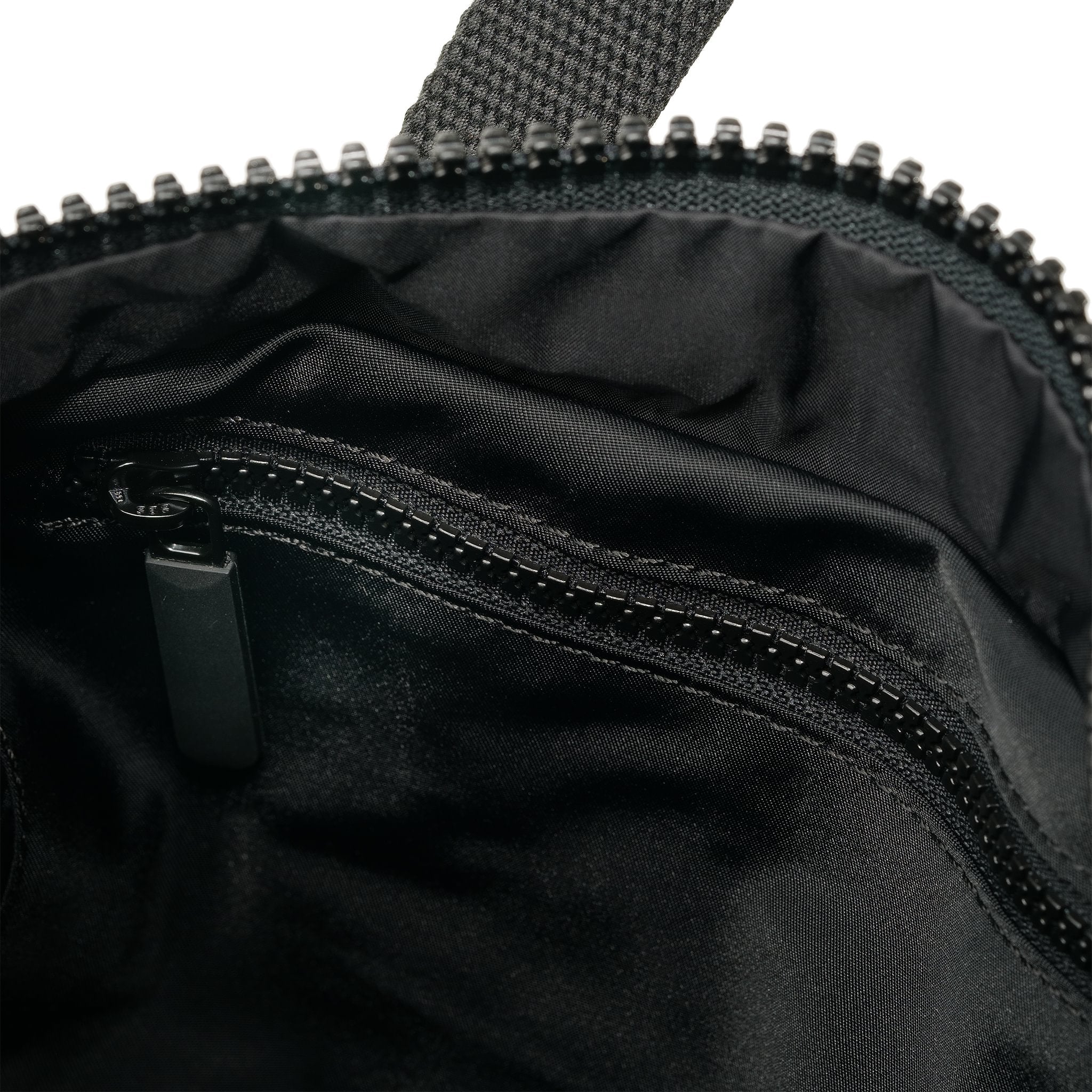 Roka Canfield Medium Avocado Recycled Nylon Backpack, side view.