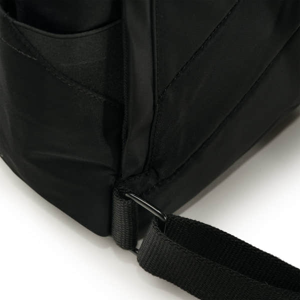 Roka Canfield Medium Avocado Recycled Nylon Backpack, strap detail.