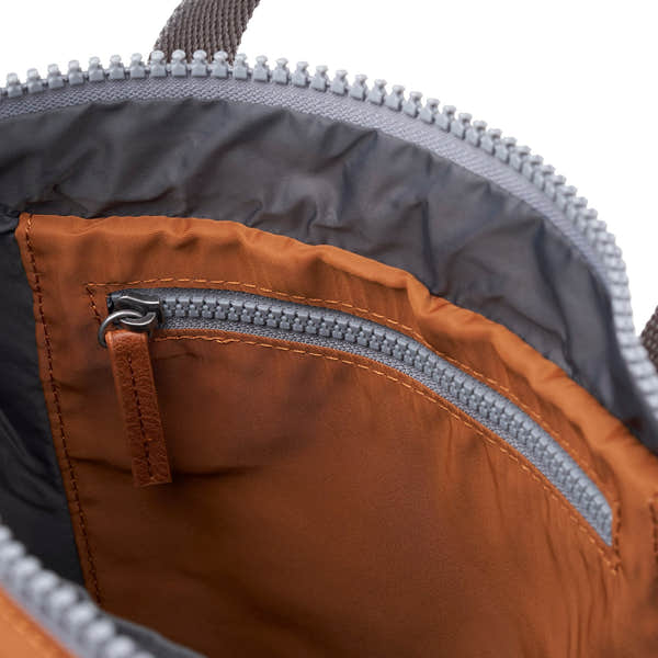 Roka Canfield Medium Bran Recycled Nylon Backpack, interior view.