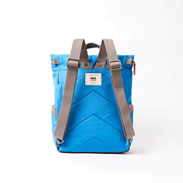 Roka Canfield Medium Malibu Blue Recycled Nylon Backpack, back view.