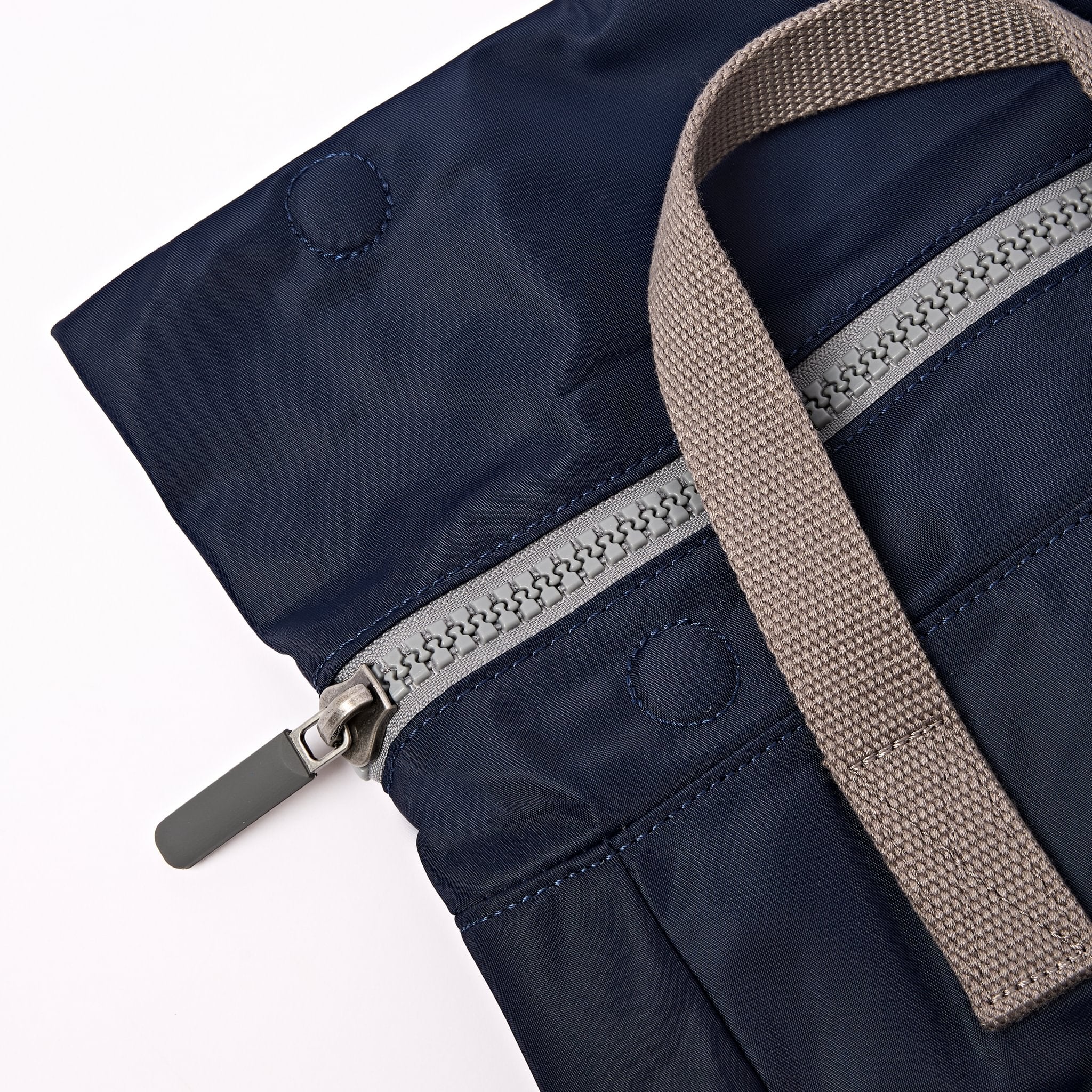 Roka Canfield Medium Midnight Recycled Nylon Backpack, zip detail.