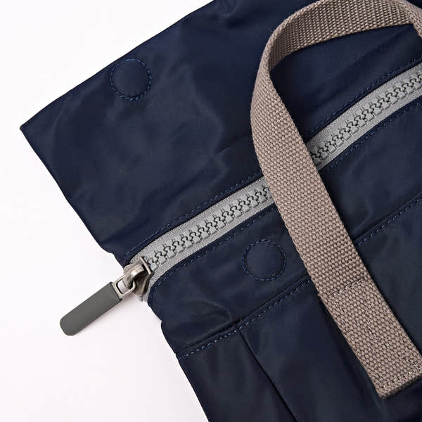 Roka Canfield Medium Midnight Recycled Nylon Backpack, zip detail.