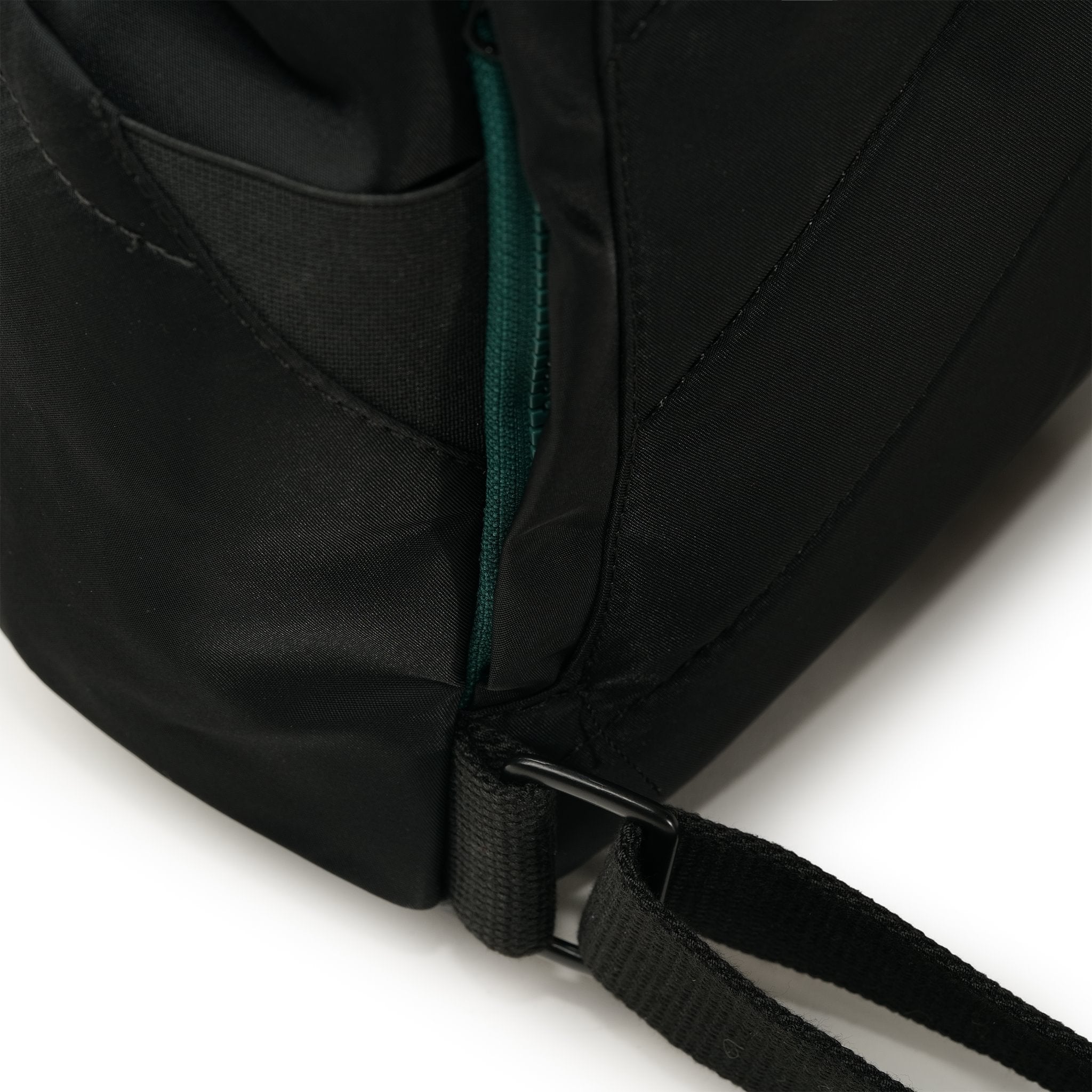 Roka Canfield Medium Teal Recycled Nylon Backpack, strap detail.