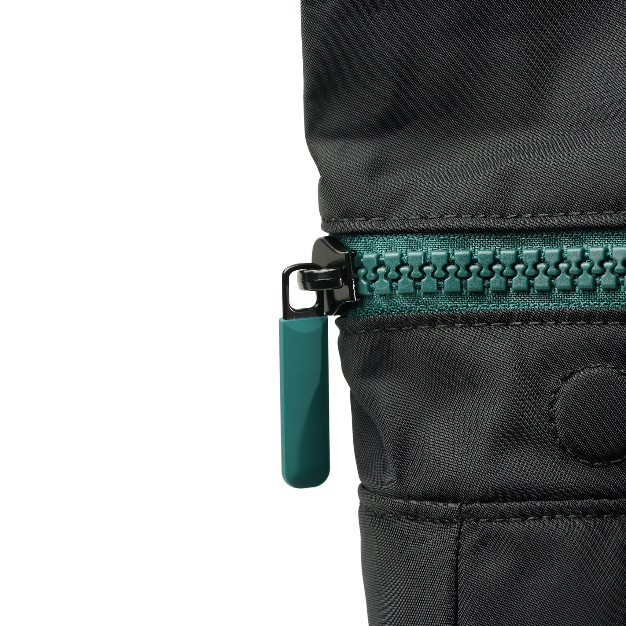 Roka Canfield Medium Teal Recycled Nylon Backpack, zip detail.