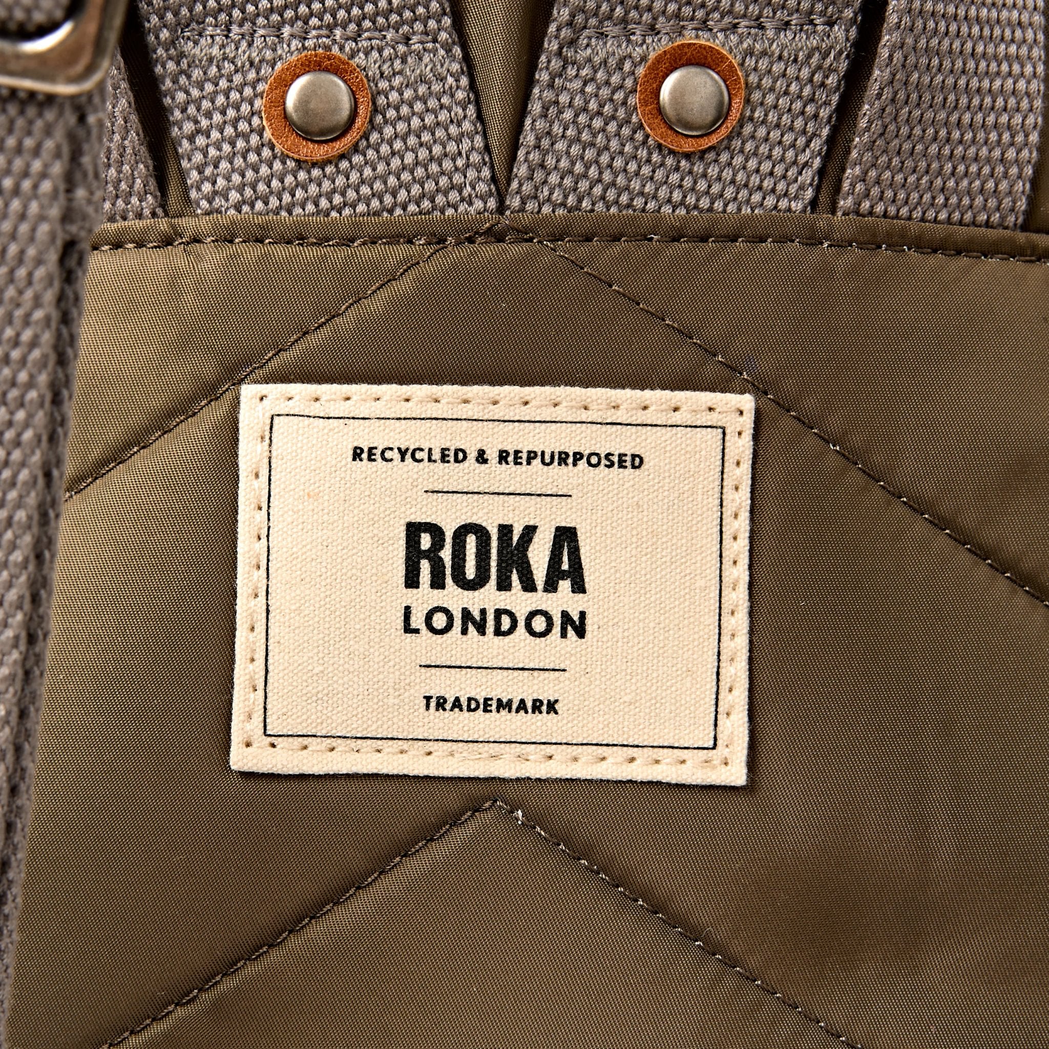 Roka Canfield Small Army Recycled Nylon Backpack, brand label detail.