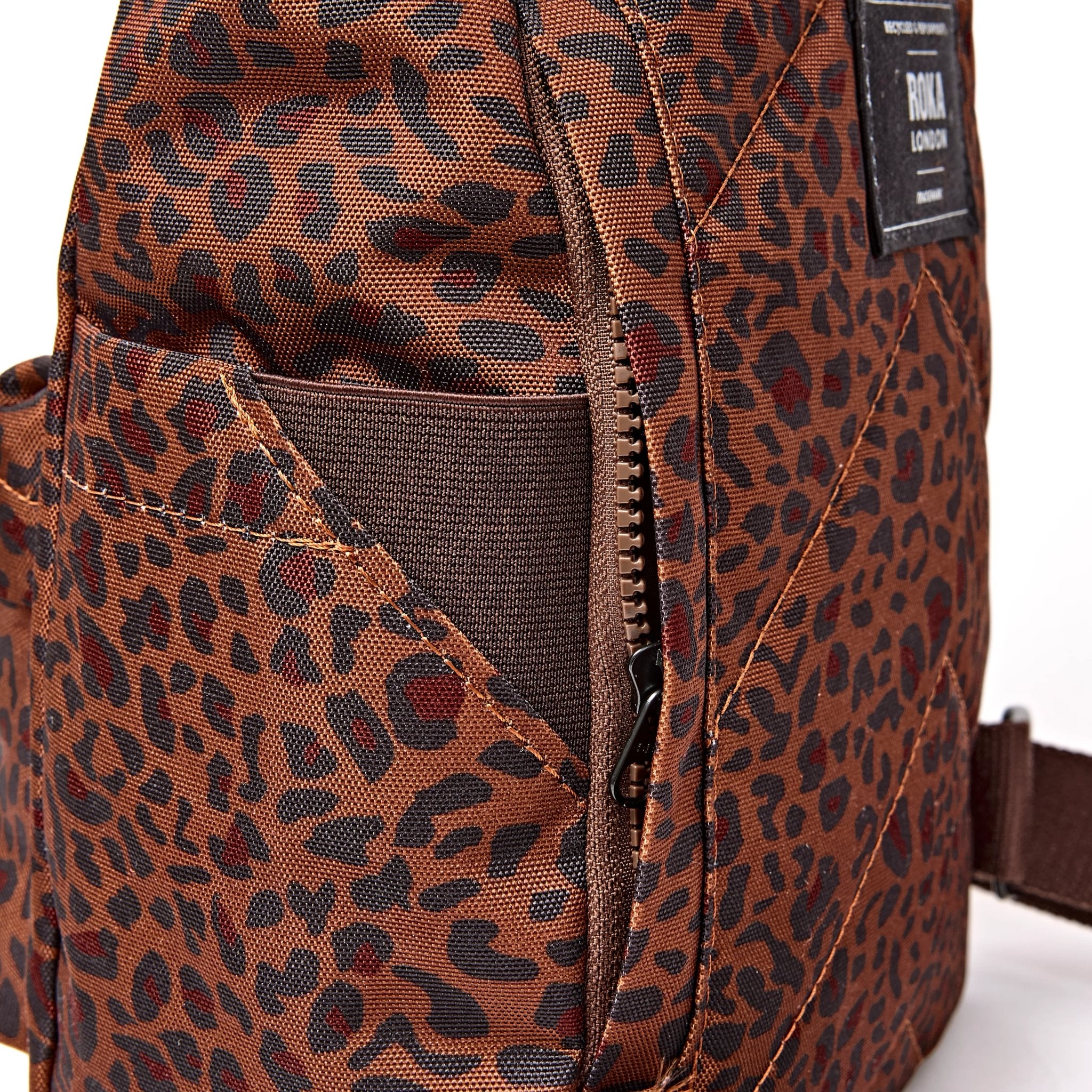 Roka Canfield Small Mini Leopard Recycled Canvas Backpack, hardware detail.