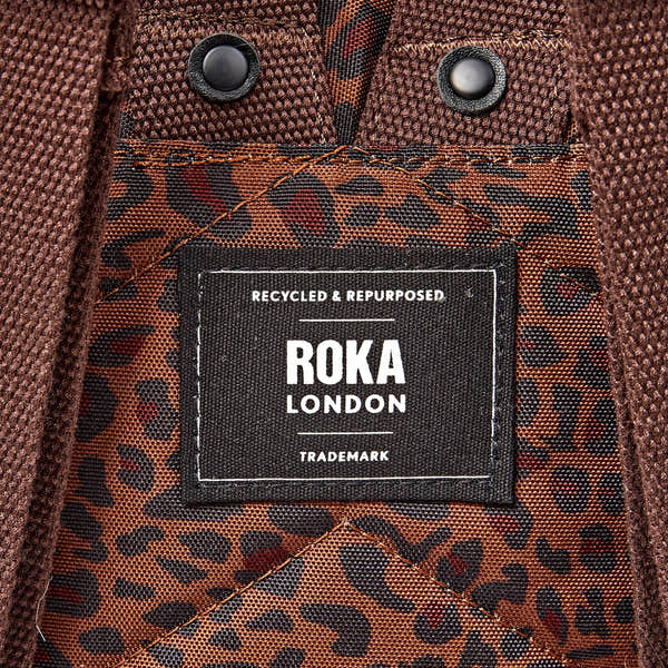Roka Canfield Small Mini Leopard Recycled Canvas Backpack, brand label detail.