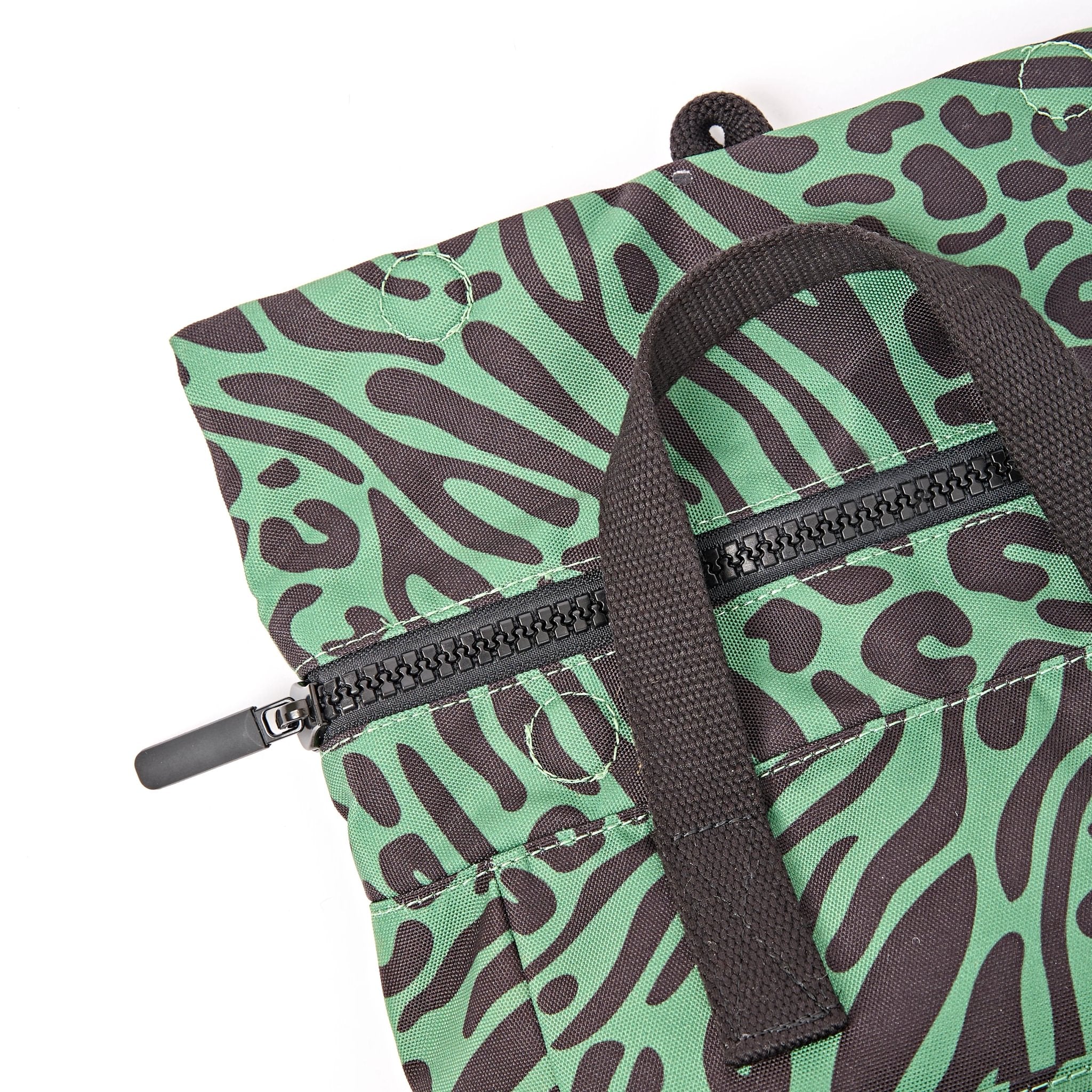 Roka Canfield Small Mixed Animal Artichoke Recycled Canvas Backpack, zip detail.