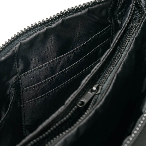 Roka Carnaby Crossbody XL All Black Recycled Canvas, side view.
