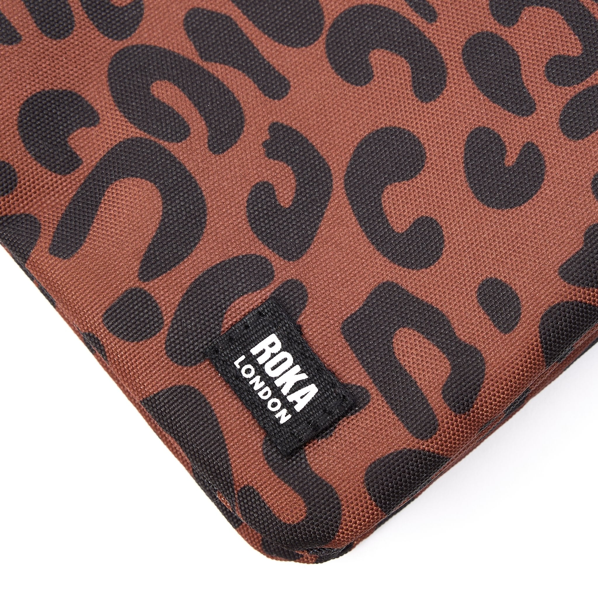 Roka Carnaby Crossbody XL Leopard Print Recycled Canvas Extra Large, brand label detail.
