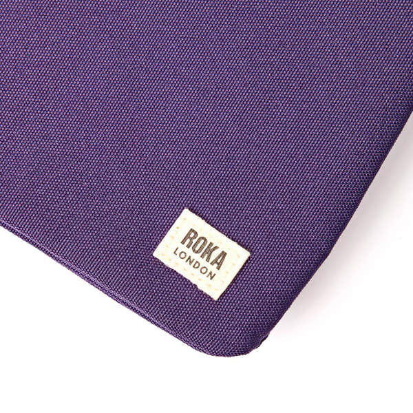 Roka Carnaby XL Deep Grape Recycled Canvas Crossbody Bag, brand label detail.