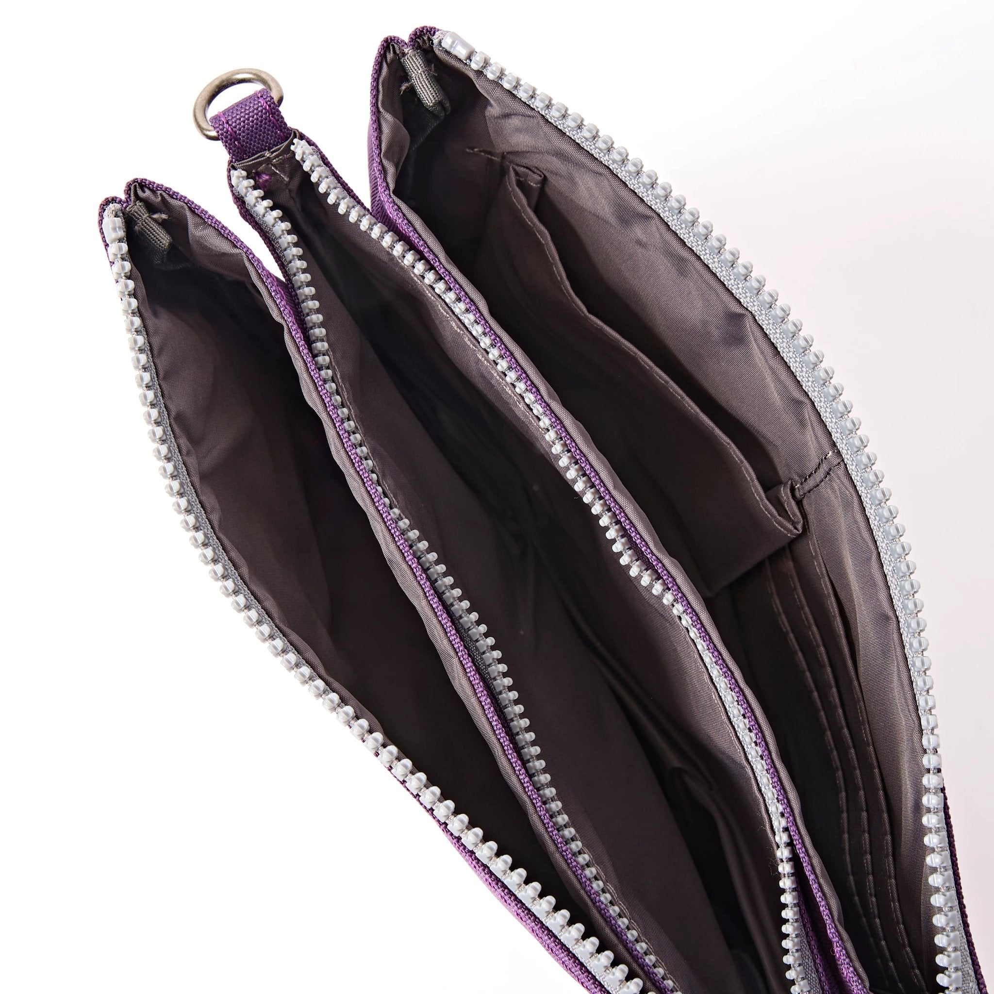 Roka Carnaby XL Deep Grape Recycled Canvas Crossbody Bag, side view.