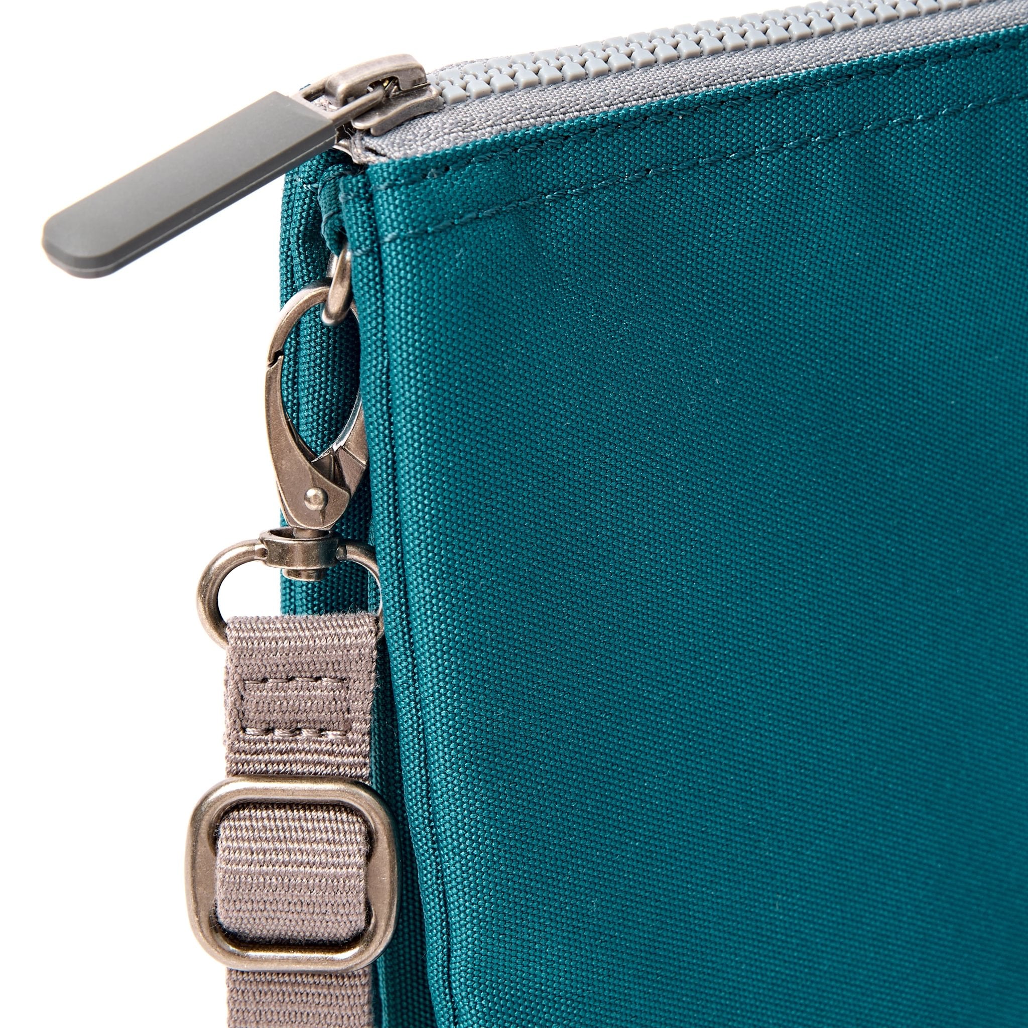 Roka Carnaby XL Deep Teal Recycled Canvas Crossbody Bag, hardware detail.