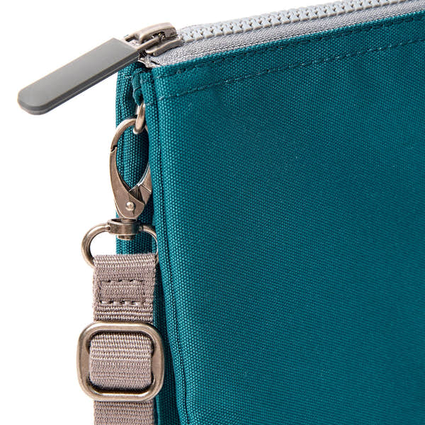 Roka Carnaby XL Deep Teal Recycled Canvas Crossbody Bag, hardware detail.