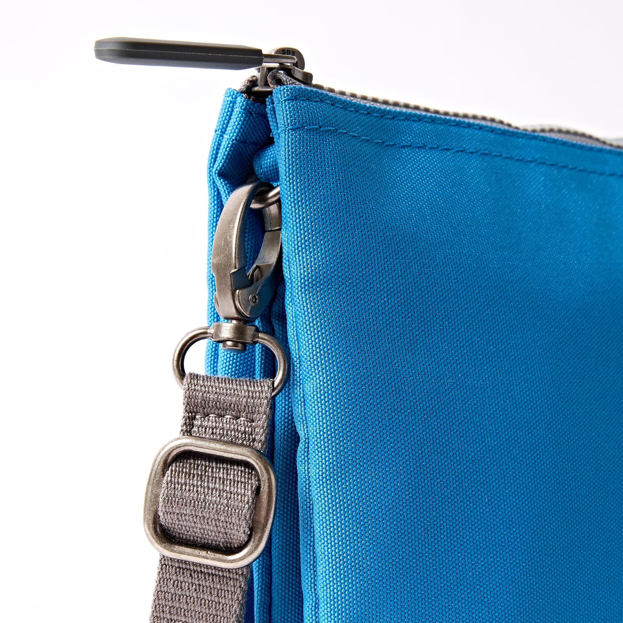 Roka Carnaby XL Malibu Blue Recycled Canvas Crossbody Bag, hardware detail.