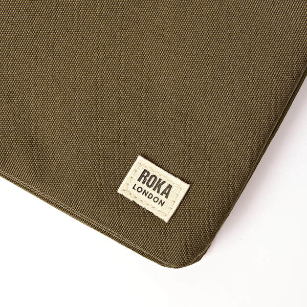 Roka Carnaby XL Sea Spray Recycled Canvas Crossbody Bag, brand label detail.