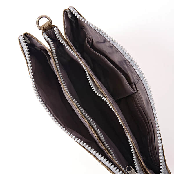 Roka Carnaby XL Sea Spray Recycled Canvas Crossbody Bag, side view.