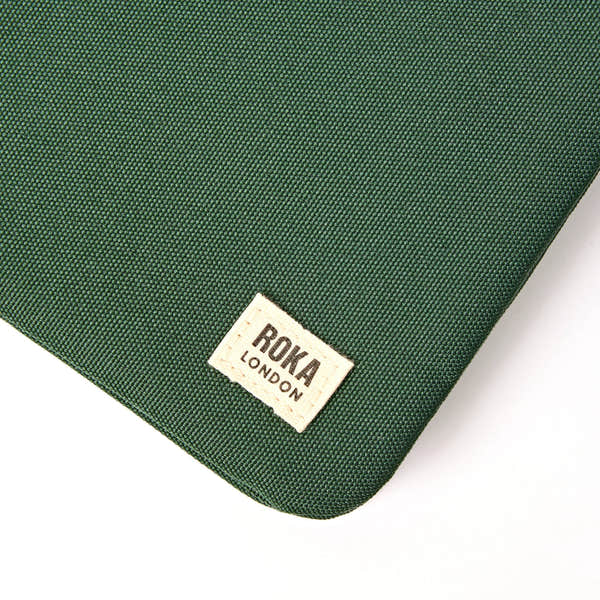 Roka Carnaby XL Thunderstorm Recycled Canvas Crossbody Bag, brand label detail.
