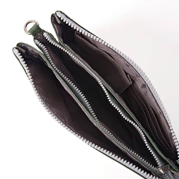 Roka Carnaby XL Thunderstorm Recycled Canvas Crossbody Bag, side view.