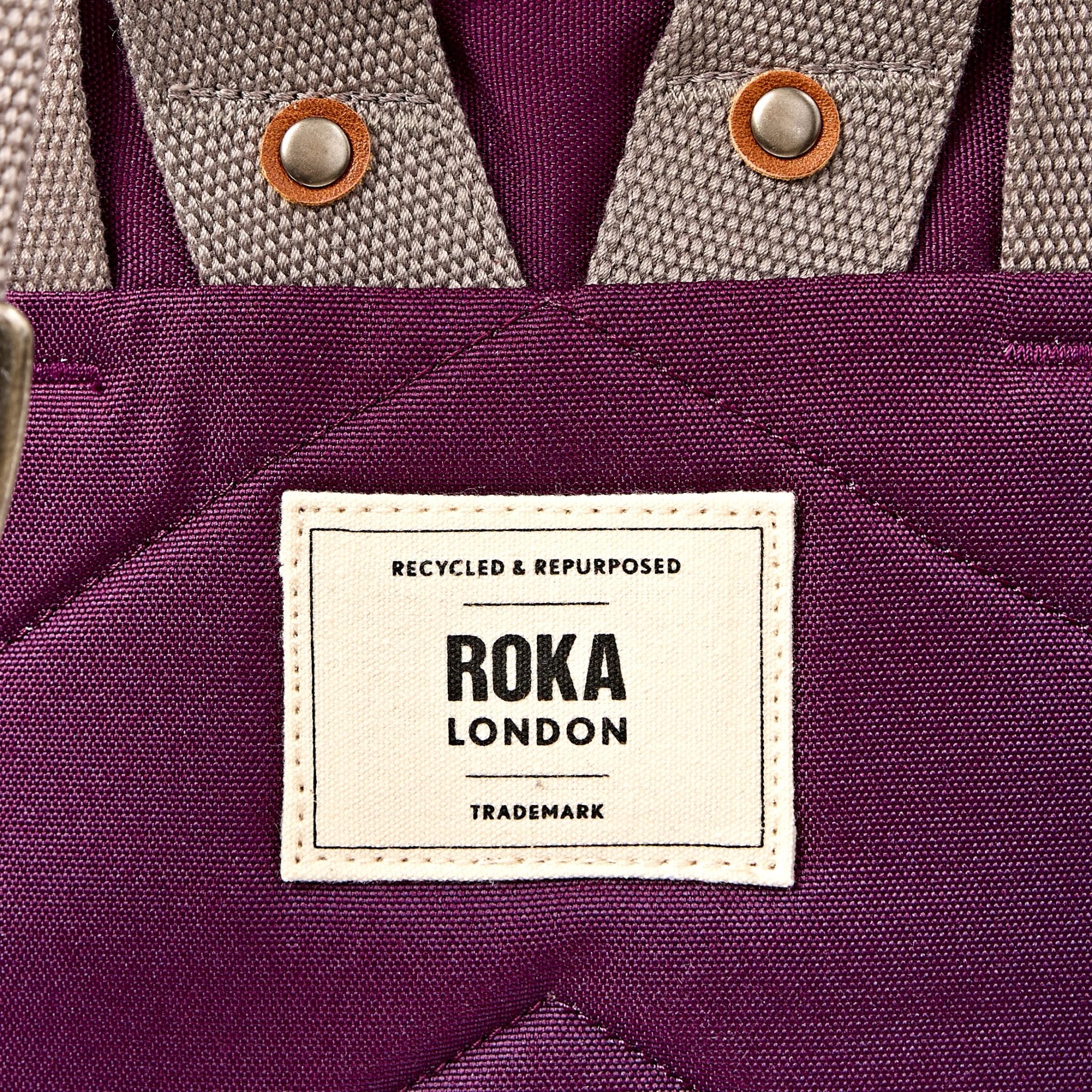 Roka Finchley A Cherry Lacquer Recycled Canvas, brand label detail.