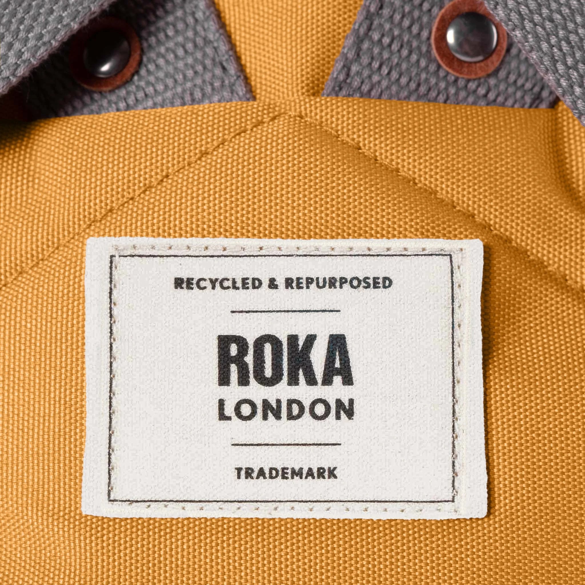Roka Finchley A Flax Recycled Canvas, brand label detail.