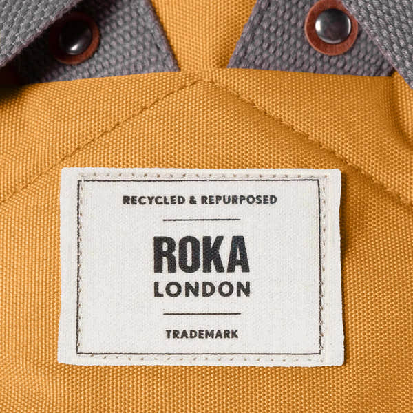 Roka Finchley A Flax Recycled Canvas, brand label detail.