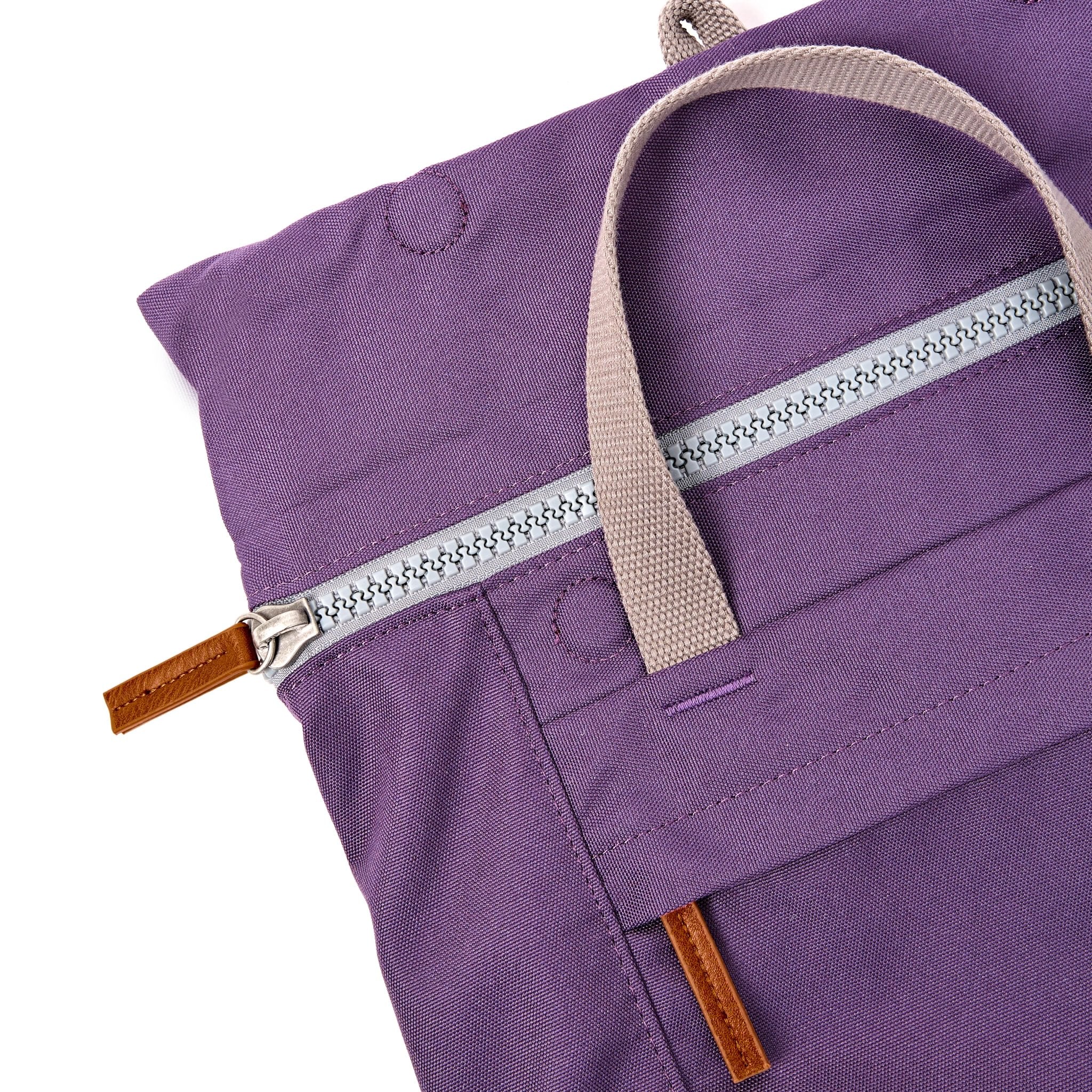 Roka Finchley Medium Deep Grape Recycled Canvas Backpack, zip detail.