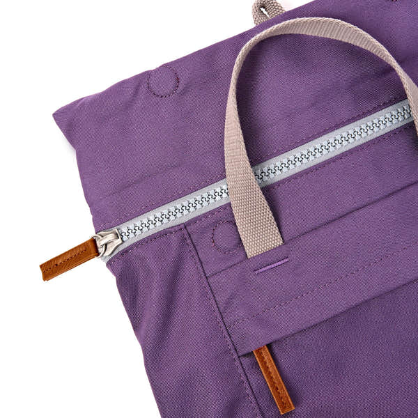 Roka Finchley Medium Deep Grape Recycled Canvas Backpack, zip detail.