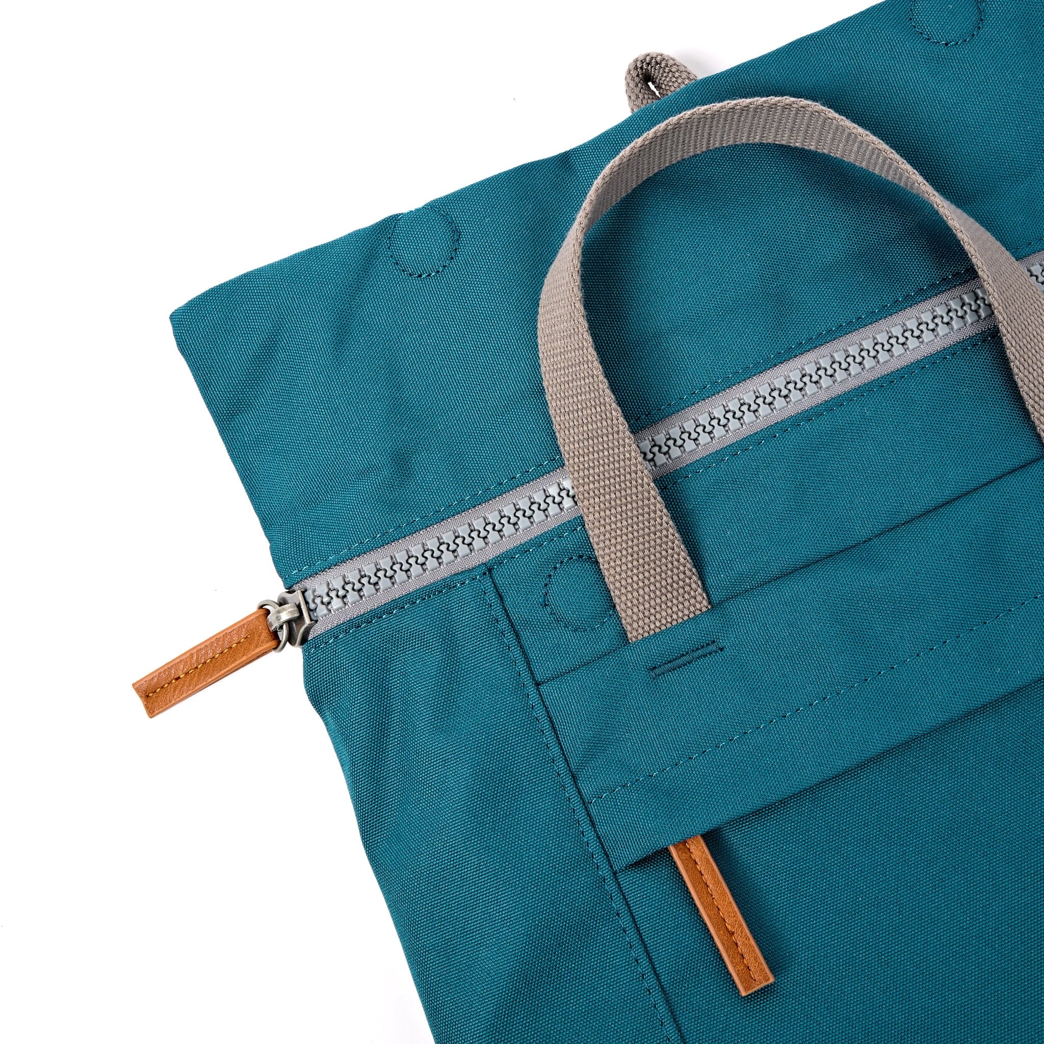 Roka Finchley Medium Deep Teal Recycled Canvas Backpack, zip detail.